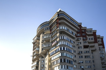 Fototapeta na wymiar new building white with red on blue sky background