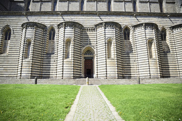 Cathedral of Orvieto, Italy. Right side characterized by two-colored marble stripes