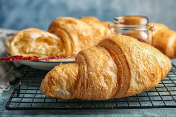 Tasty croissant on table, closeup