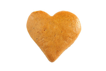 Heart shaped gingerbread cookie isolated on white background. Top view.