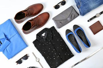 Flat lay set of stylish clothes and accessories on white background