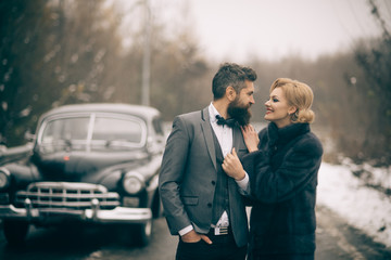 love and relations. love relations of woman in coat and bearded man.