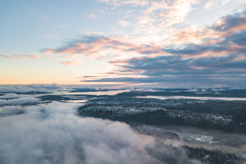 Fototapeta na wymiar Aerial view of a coast of Ladoga Lake over the fog
