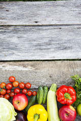 Collection of various vegetables and fruits on rustic wooden background. Copy space. Top view. From above.