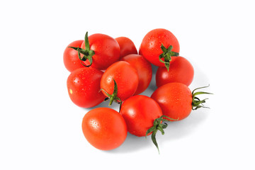 red cherry tomatoes with water drops on white background, isolate, close-up