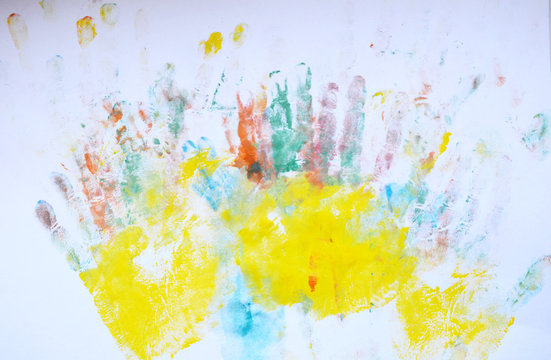 multicolored prints of hands, children's creativity, drawing