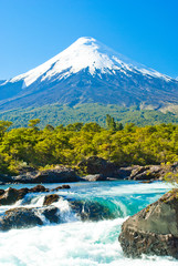 Waterfalls with volcano Osorno at the background in Chile © Rodrigo