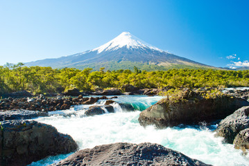 Waterfalls with volcano Osorno at the background in Chile