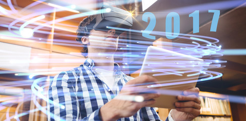 Digital image of new year 2017 against close-up of digital fiber optics