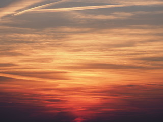 Fototapeta premium Picturesque colorful sky at sun set with clouds formation seen in spring evening from european city in Poland