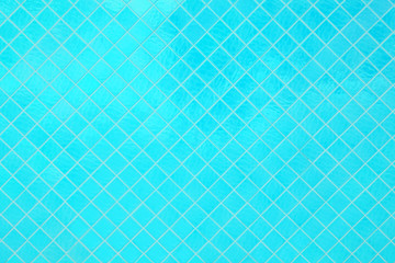 Light blue mosaic texture and background.