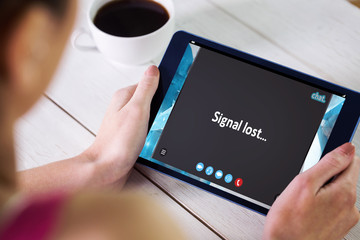 Woman using tablet pc against music app