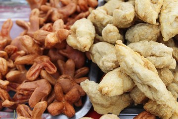 Fried meatballs and sausage at street food