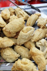 Fried meatballs and sausage at street food