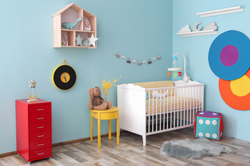 Interior of baby room with comfortable crib