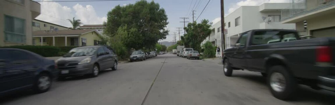 Front view of a Driving Plate. Car travels through a residential area on El Centro Avenue in Los Angeles, California from Gregory Avenue to Santa Monica Boulevard and turns right, continuing on Santa Monica to Gower Street.