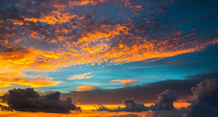 Sunlight with dramatic sky on dark background.Vivid sky on dark cloud.
