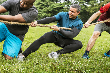 Team competing in tug of war