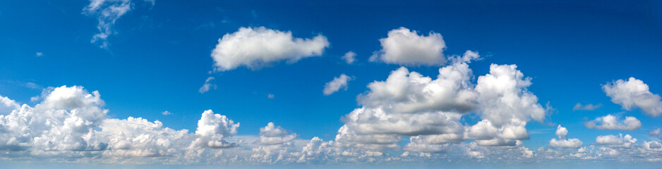 Naklejka na ściany i meble panorama Sunlight with blue sky on dark background.Vivid sky on white cloud.