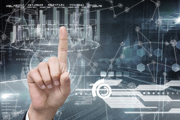 Hand pointing against hologram background