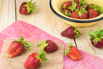 Bowl of fresh picked farm organic strawberries.