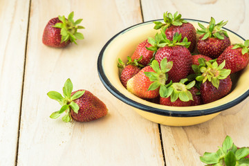 Bowl of fresh picked farm organic strawberries.