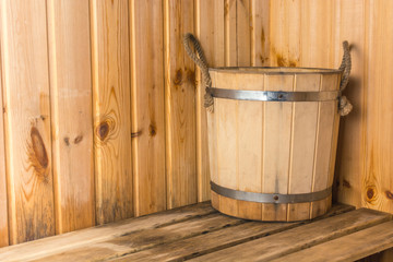 Wooden bucket for water in the bath