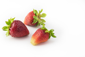 Isolated fresh farm organic strawberries.
