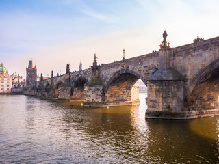Fototapeta premium Charles bridge in Prague Czech Republic during sunset, close-up.Beautiful romantic for couple traveler.