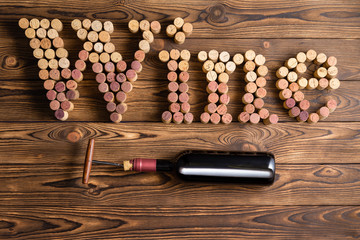Wine letters arranged of corks with bottle