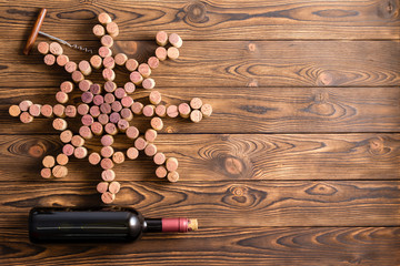 Nautical wheel made of wine corks with bottle