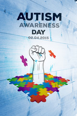 Autism awareness day against bleached wooden planks background