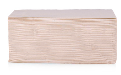 Stack of the pink paper napkins on white background