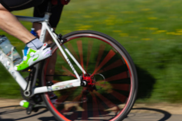 Fototapeta na wymiar cyclists on a raceday blurred view