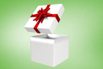 White and red gift box against green vignette