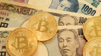 Bitcoin on Japanese Yen Bills. Concept for Cryptocurrencies in Japan