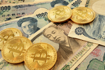 Bitcoin on Japanese Yen Bills. Concept for Cryptocurrencies in Japan