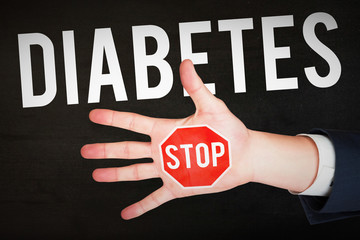 Hand with fingers spread out against black