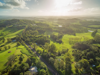 Obraz premium Aerial view of countryside with meadows and pastures at sunset in New South Wales, Australia