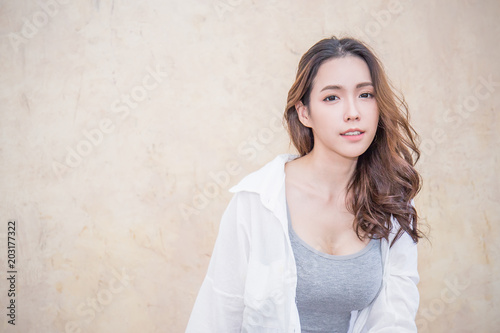 Portrait Of Young Beautiful Asian Woman Sit And Relax Over Vintage Wall Smile Happy Asian Girl Looking Lifestyle People Beauty Girl Next Door Concept Portrait Of Young Beautiful Asian Woman Sit And Relax Over Vintage Wall Smile Happy Asian Girl Looking Lifestyle People Beauty Girl Next Door Concept