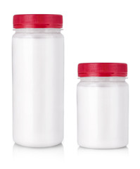 white jar with red cap without label on a white background.