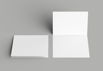 Bi fold vertical - landscape brochure or invitation mock up isolated on gray background.