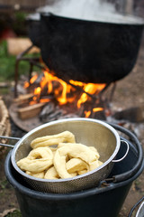 Boiling bagels in a cast iron pot