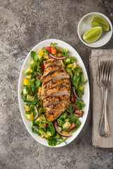 grilled chicken breast with vegetable salad,