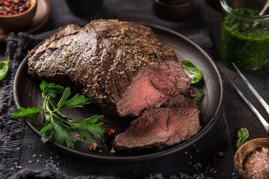 delicious roast beef with green parsley sauce