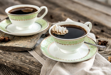 two cups of black coffee