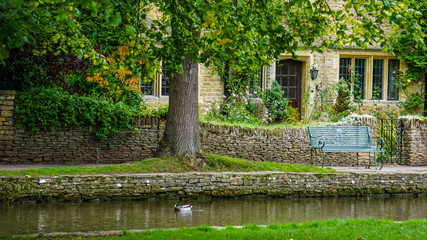 Houses on the river in Bourton-on-the-Water in the Cotswolds, England