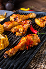 Rustic Grilled chicken wings,legs,and spicy corn