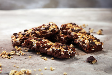 Granola bar. Healthy sweet dessert snack. Cereal granola bar with nuts, fruit and berries