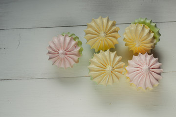 meringue cake, meringue on a white table assorted